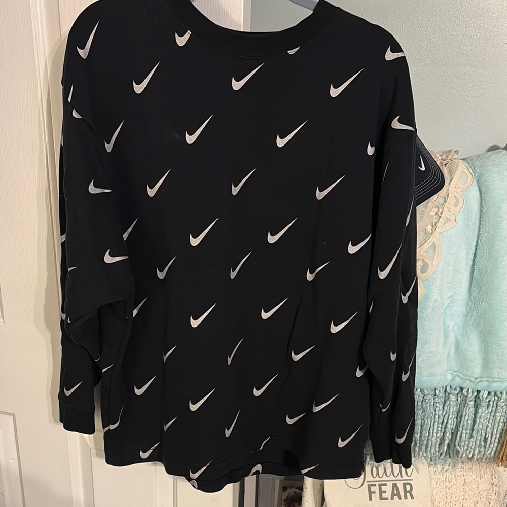 Nike Black Long Sleeve Shirt with White Swoosh Pattern